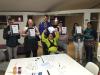 Some earth allies participants posing with their certificates