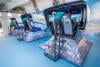 School pupils and flight instructors flying in flight simulators