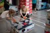 Pupils work together at an interactive energy exhibit