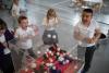Pupils watch a chain reaction demonstration
