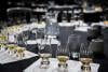 Lines of whisky-filled glasses sit on top of tables prior to the event.