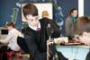 School pupils in an engineering workshop